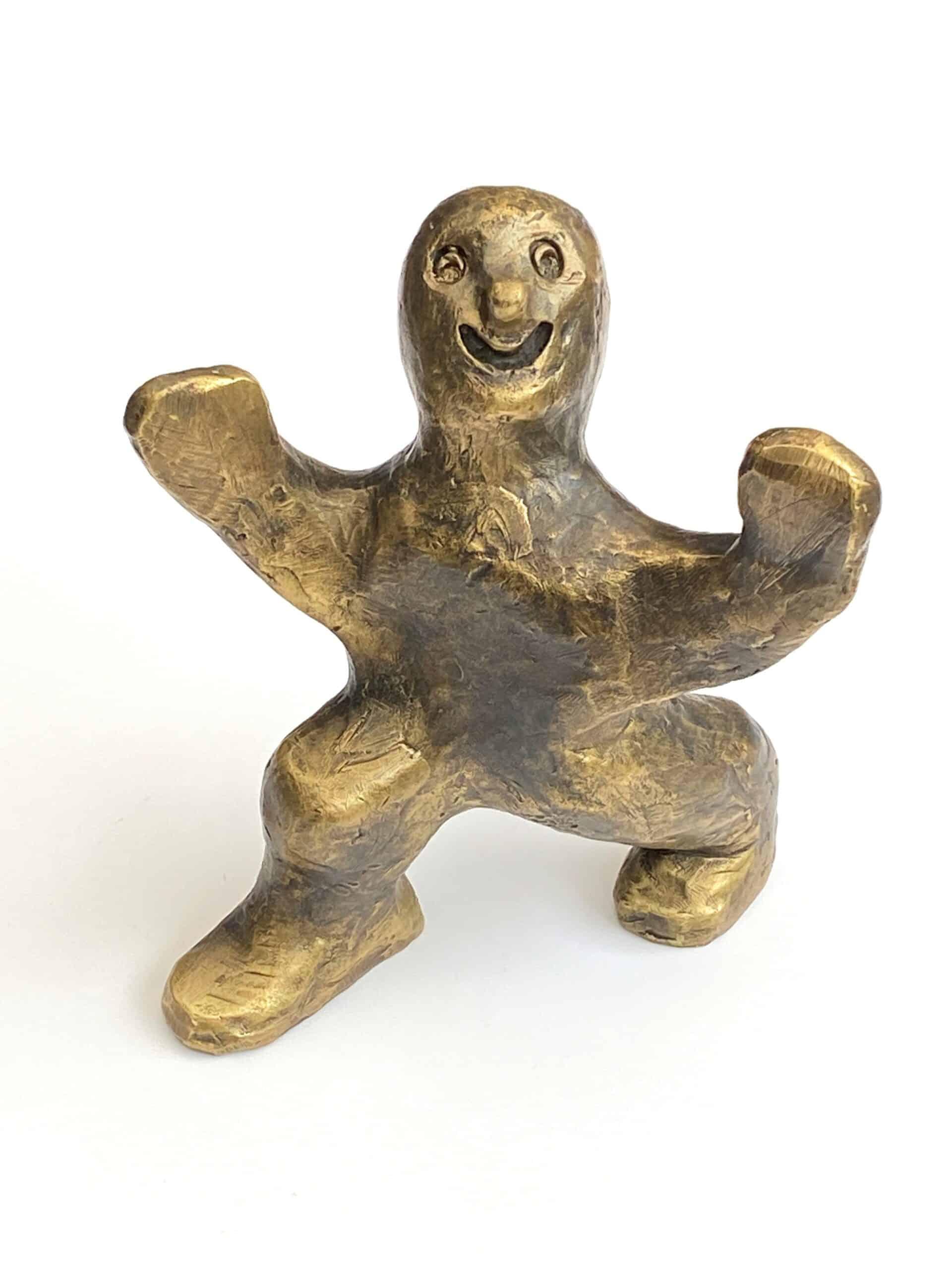 Den aktive bronzeskulptur af Palle Mernild med bevægelig figur